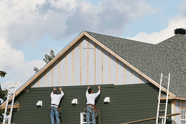 Professional Storm Damage Siding Repair technician working in Millheim, PA